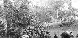 marines_rest_in_the_field_on_guadalcanal